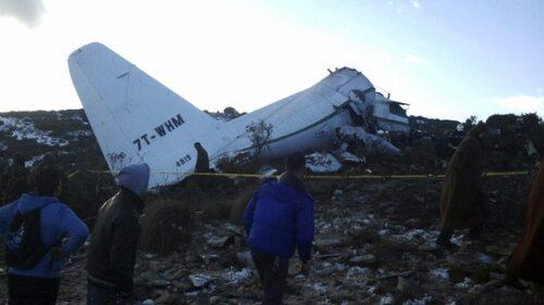 A crashed military plane is pictured in Oum El Bouaghi province, about 500km (311 miles) from the capital Algiers, February 11, 2014. A military transport plane carrying members of the armed forces and their relatives crashed into a mountain in eastern Algeria on Tuesday. The defence ministry said a total of 77 people died in the crash. REUTERS/Stringer (ALGERIA - Tags: TRANSPORT DISASTER TPX IMAGES OF THE DAY)