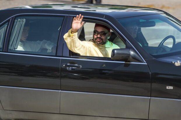 Moroccan king Mohammed VI (front seat) and the crown prince of Morocco, Moulay Hassan (back seat) leave a ceremony of allegiance, at the King's palace in Tetouan, on July 31, 2018, to mark the 19th anniversary of Mohammed VI's accession to the throne. (Photo by FADEL SENNA / AFP) (Photo credit should read FADEL SENNA/AFP/Getty Images)