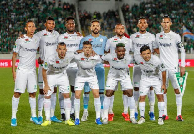 Raja's starting eleven pose for a group picture during the first leg of the CAF Champions League Quarter-final football match between Morocco's Raja Casablanca and Congo's Mazembe at the Mohammed V in the city of Casablanca on February 28, 2020. (Photo by STR / AFP)