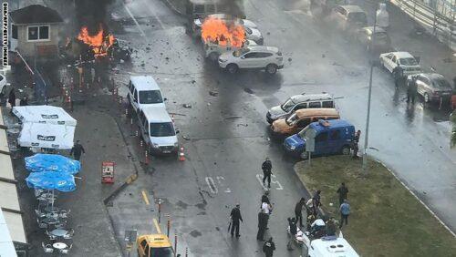 Cars burn in the street at the site of an explosion in front of the courthouse in Izmir on January 5, 2017. A car bomb exploded outside a courthouse in the western Turkish city of Izmir, wounding at least 10 people and sparking clashes in which at least two "terrorists" were killed, officials and reports said.Several ambulances were rushed to the scene after the blast outside the prosecutors and judges' entrance to the court in the usually peaceful city on the Aegean Sea, the channel said. / AFP / DOGAN NEWS AGENCY / DHA (Photo credit should read DHA/AFP/Getty Images)
